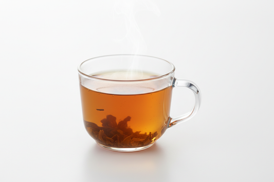 a realistic transparent tea cup with tea in it